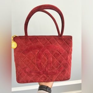 100%, Entrupy authenticated Burgundy Suede Chanel Medallion Tote.